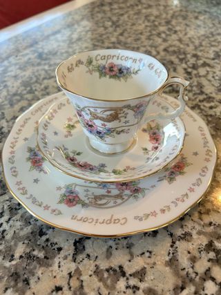 Xícara e pires Capricórnio