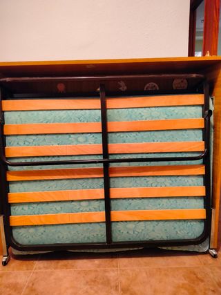 Cama plegable ,con mueble de madera,