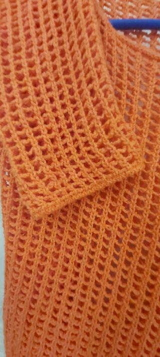 Jersey naranja calado mujer
manga larga 