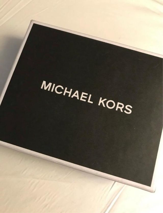 Cartera Michael Kors marrón para hombre