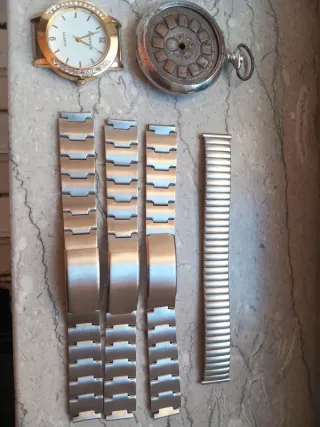 Orologi vintage + braccialetti
Prezzo affare