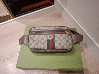 Riñonera , bolso Gucci original piel marrón. 