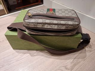 Riñonera , bolso Gucci original piel marrón. 
