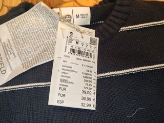 Jersey azul marino con rayas blancas