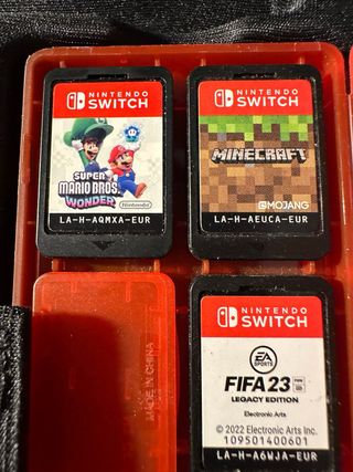 Nintendo Switch + 7 juegos + volante + funda 