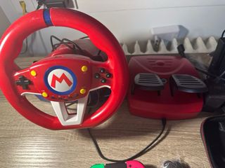 Nintendo Switch + 7 juegos + volante + funda 