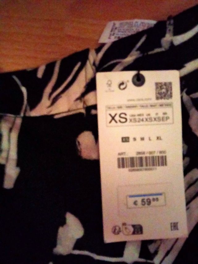 Falda midi Zara - negra estampada