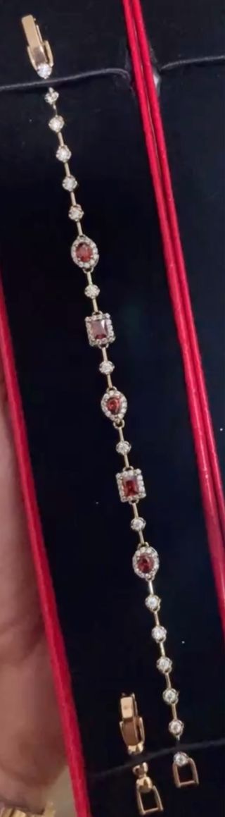Pulsera oro circonitas rojas