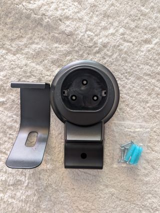 Soporte pared manguera cargador coche eléctrico