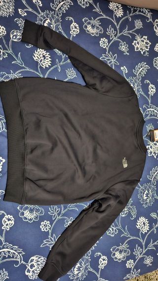 Sudadera The North Face negra original.