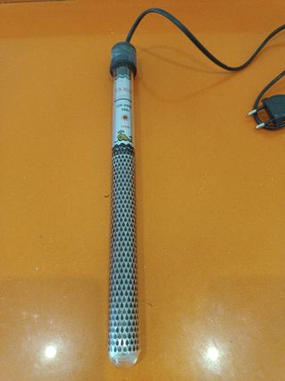 Carcasa filtro más calentador acuario