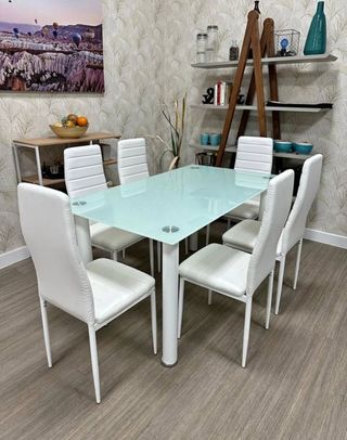 Mesa cristal 6 sillas blancas