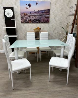 Mesa cristal 6 sillas blancas