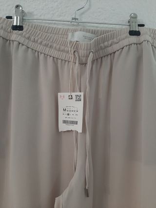 Pantalón beige suelto zara 