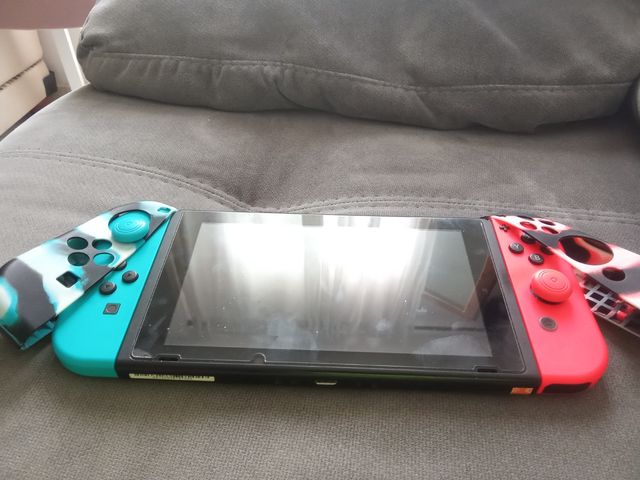 Nintendo Switch:2 mandosPro +4 juegos+ tarjeta256g
