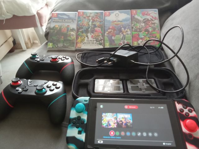 Nintendo Switch:2 mandosPro +4 juegos+ tarjeta256g