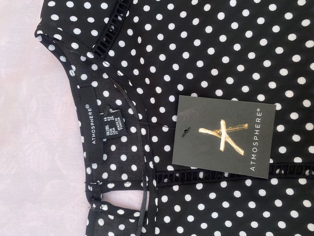 Blusa lunares blanco-negro