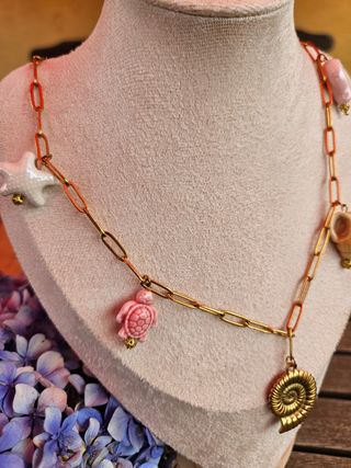 Collar en acero con charm peces, tortugas ...
