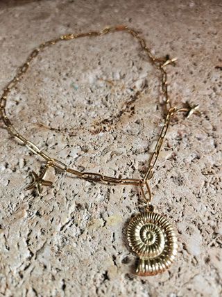 Collar en acero con charm peces, tortugas ...