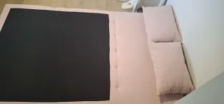 Sofá cama SKLUM rosa.