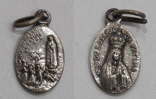 LOTE DE 7 MEDALLITAS RELIGIOSAS.