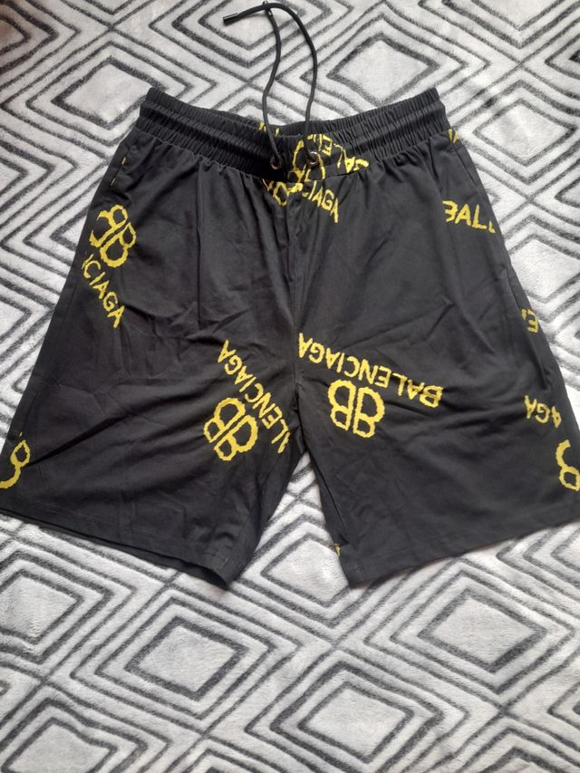 Conjunto corto hombre negro y amarillo