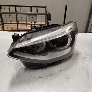 FARO IZQUIERDO BMW E82 - E88 XENON 