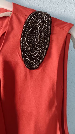Blusa anaranjada c/apliques