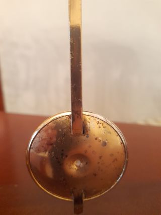 Reloj con candelabros dorados