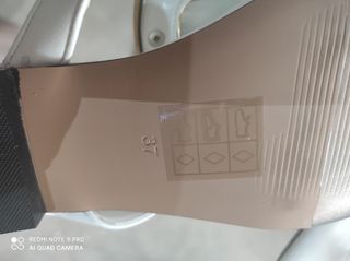 Sandalias blancas doradas