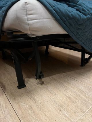 Sillón cama verde oscuro con funda 