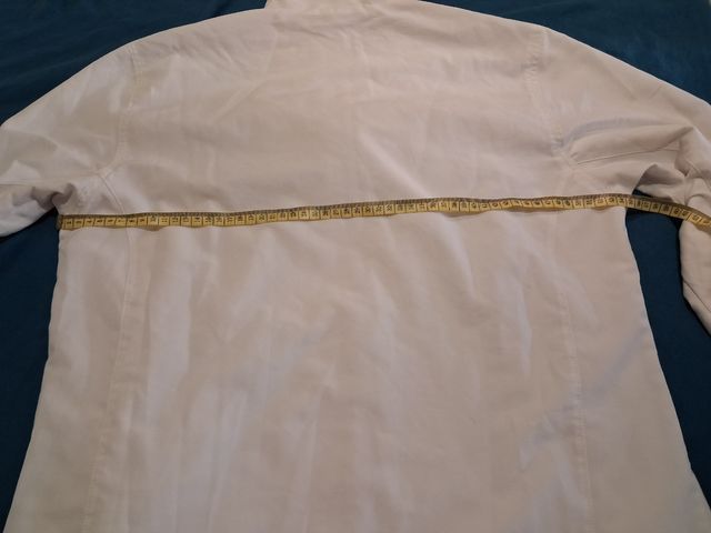 Chándal Adidas retro blanco y azul marino.