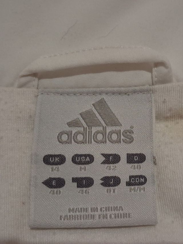 Chándal Adidas retro blanco y azul marino.