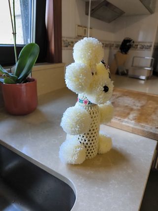 2 peluches perros pompon