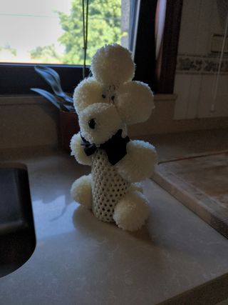 2 peluches perros pompon