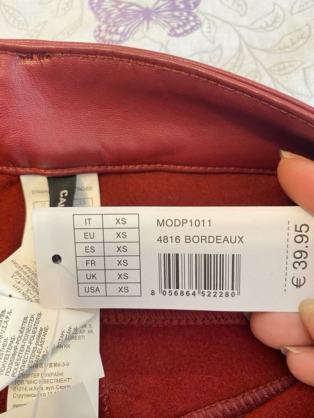 Pantalones polipiel Calzedonia color burdeos