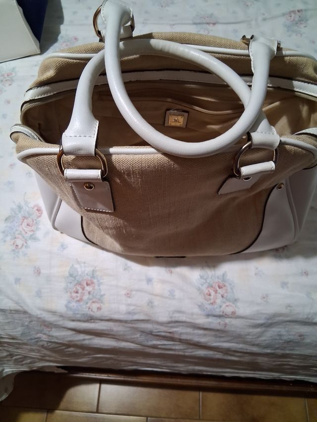 Borsa a mano di tessuto della Carpisa 