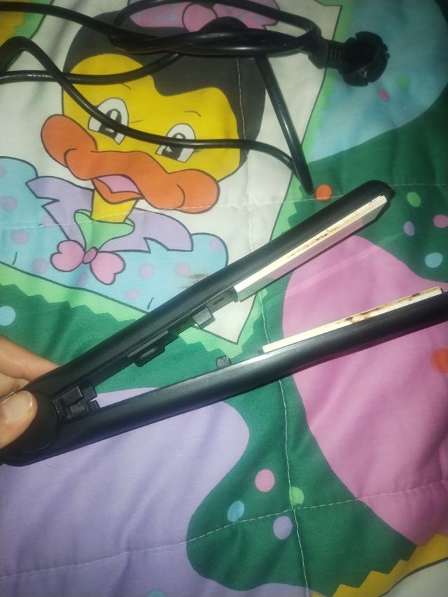 Plancha pelo negra - buen estado