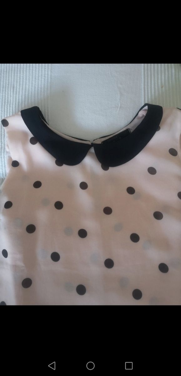 Blusa lunares rosa y negra