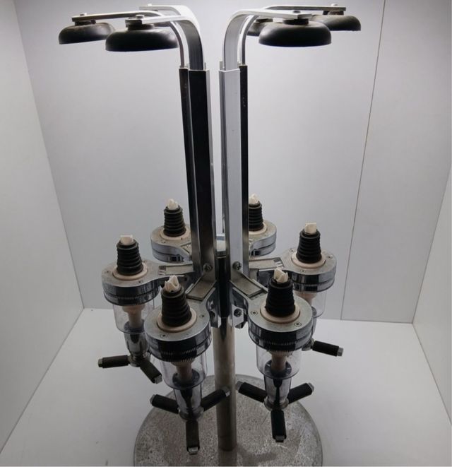 supporto girevole per liquori