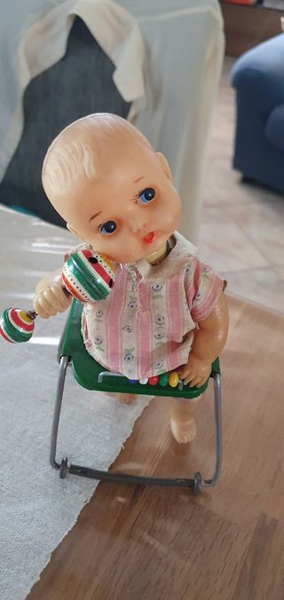 Antica bambola meccanica in metallo m