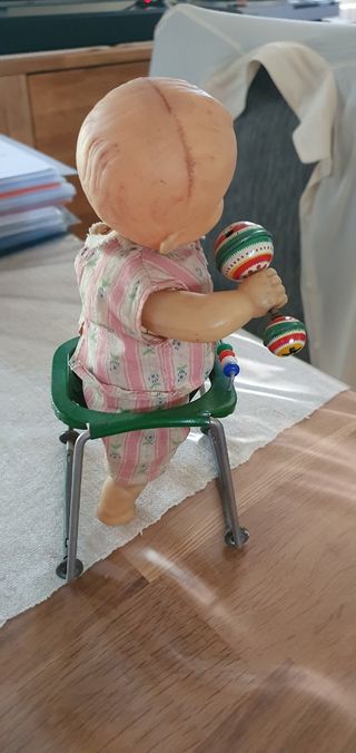 Antica bambola meccanica in metallo m