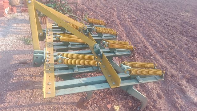 Cultivador de resortes