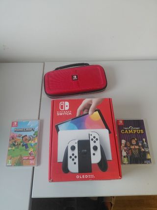 Giochi OLED + custodia per Nintendo Switch.    
