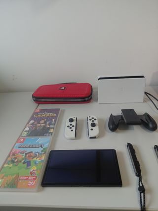 Giochi OLED + custodia per Nintendo Switch.    
