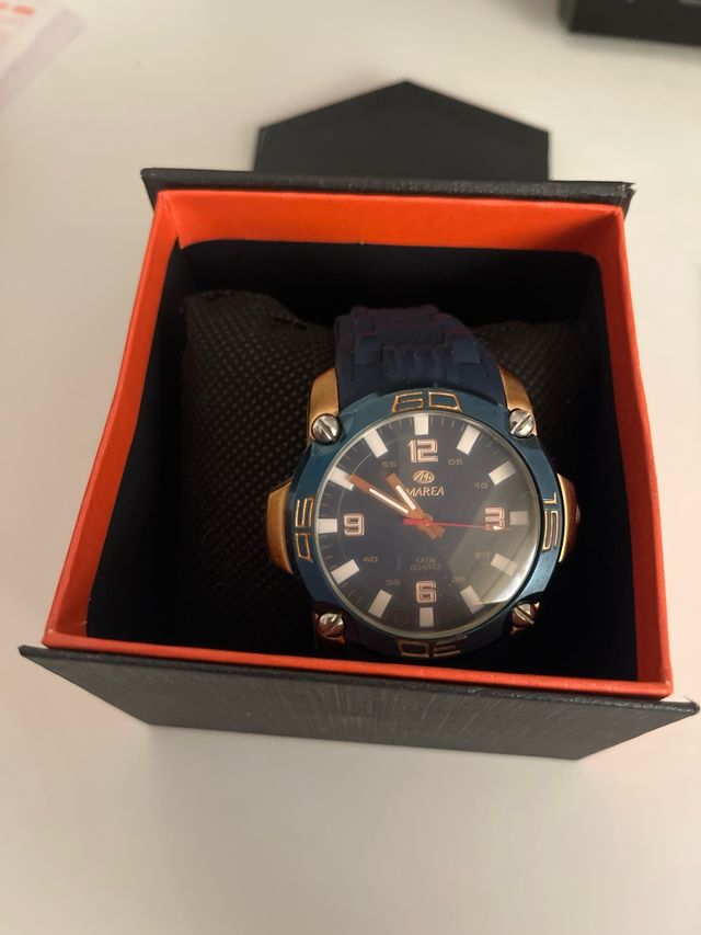 Orologio Marea blu e oro