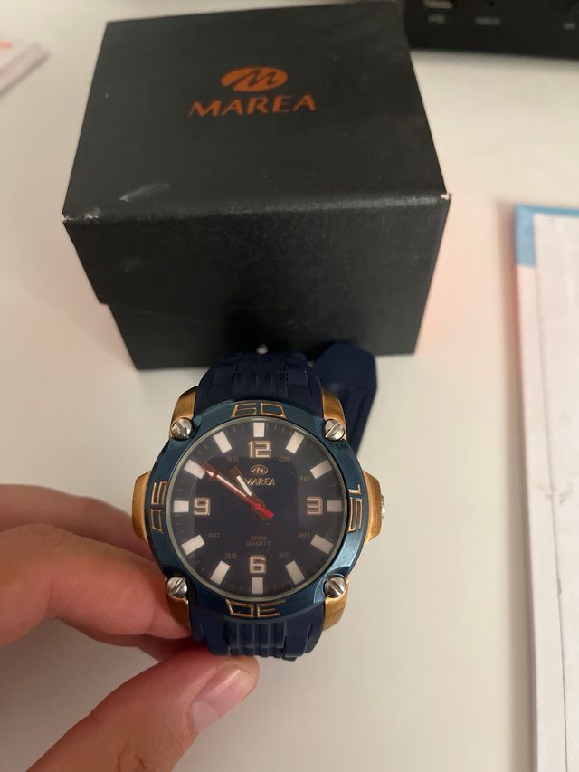 Orologio Marea blu e oro