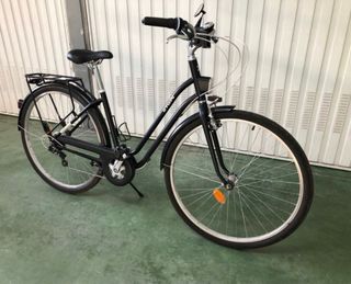 Bicicleta paseo Btwin elops 500 M- cesta+ candados