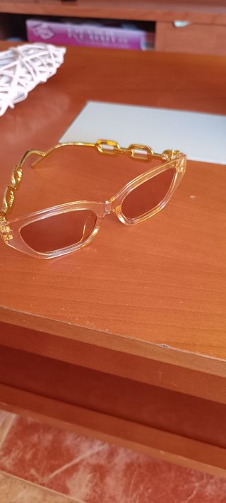 Gafas de sol estilo cadena beige