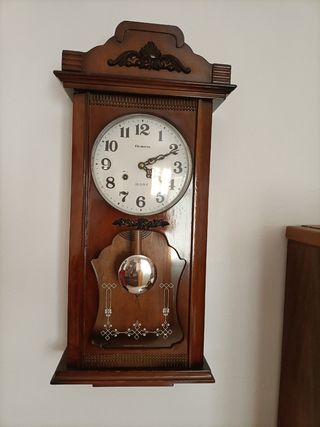 Reloj de pared antiguo Rolens